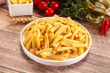 Raw dry Italian pasta - casarecce
