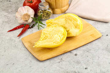Italian traditional yellow Scamorza cheese