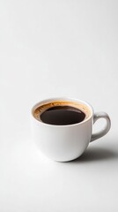 A warm cup of freshly brewed coffee rests on a minimalist white background, inviting quiet moments of reflection or a cheerful chat with friends, enhancing the vibe of tranquility in everyday life