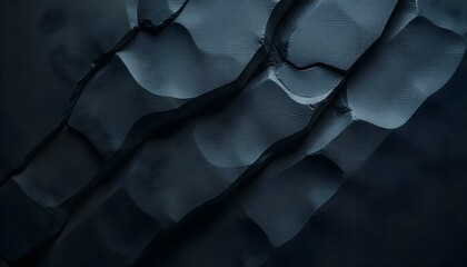 Obraz premium A close-up shot of a dark gray rock face, with diagonal cracks and crevices running across the surface, creating a rugged and textured appearance