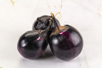 Raw violet and black eggplant