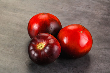 Black ripe juicy organic tomato