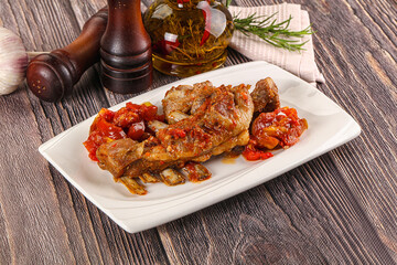 Baked lamb ribs with vegetables