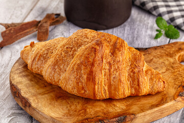 Fresh hot homemade croissant for breakfast