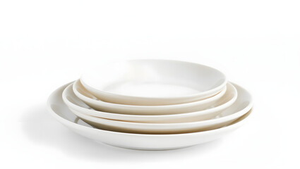 a stack of clean white plates, various sizes. They are simple and modern in design