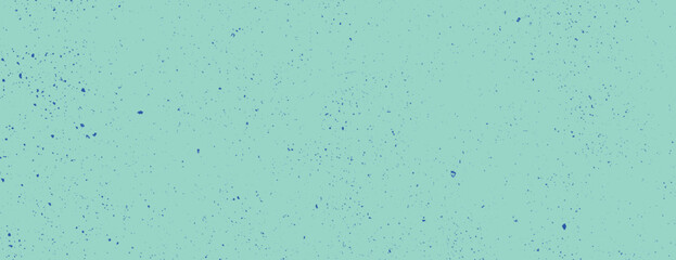 Naklejka premium A mint green background with a speckled texture. The background features blue speckles on a mint green surface, creating a lively pattern. Speckled wall texture background. Turquoise background vector