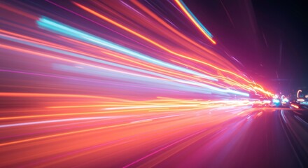 Speeding Lights Abstract: a dynamic and abstract shot of a highway at night. The image uses long exposure to capture light trails from passing vehicles, creating a sense of rapid motion and energy.