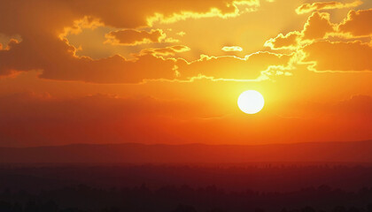 Sunset scenery with clouds over distant mountains