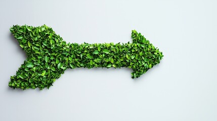 Green Arrow Made of Leaves Representing Nature and Sustainability Ideas