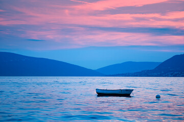 picturesque sunset seascape, Bay Kotor, Tivat Bay, Montenegro, mountains in background, maritime...