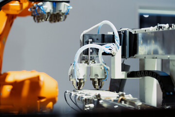 robot arm working in factory