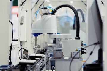 robot arm working in car factory