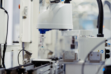 robot arm working in factory