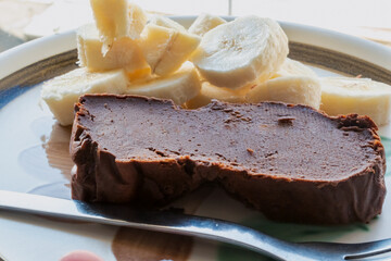 Skyr and chocolate cake, gluten free recipe with banana pieces, healthy food