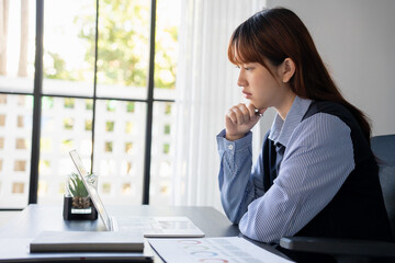 Asian businesswoman online meeting by laptop, work from home concept