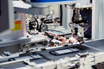 robot arm working in factory