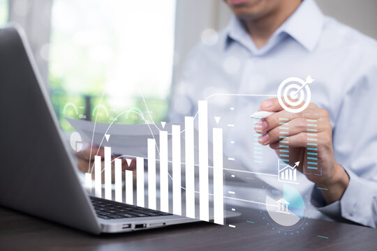 Concept financial transactions online, Group business and point at financial analyzing data while discussion, Businesspeople Point darts aiming at the target center business,Targeting the business.