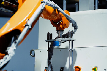 robot arm working in factory