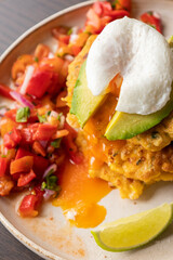  delicious corn fritters with salsa and poached egg – the perfect brunch