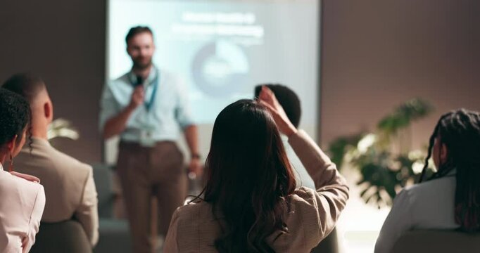 Business people, speaker and presentation with question in audience for interaction, feedback or engagement at office. Group, employees or seminar with hands raised for proposal at speech convention