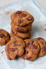 Chocolate cookies on a baking tray. Homemade baking.