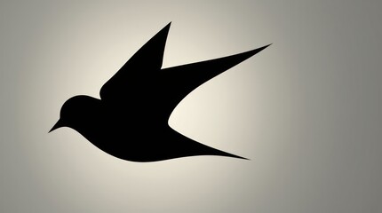 Obraz premium This minimalist design showcases a black and white silhouette of a swallow in flight, representing freedom and elegance in a clean, high-contrast composition