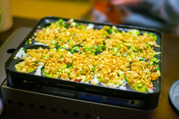 たこ焼きを焼く