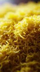 Vibrant closeup of grated yellow cheese with soft shadows