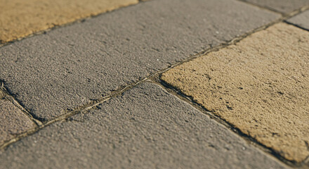 Fototapeta premium Textured Paving Stone Close up Gray and Beige Cobblestone Surface Detail