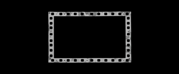 Film strip frame with grungy textured look presented against stark black backdrop for visual emphasis