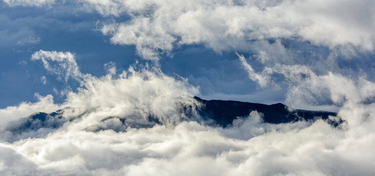Clouds and mist around the peaks of Bale Mountains National Park. Ethiopia.