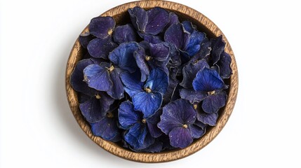 Dried hydrangeas in bowl, overhead view