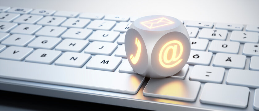 Illuminated dice with communication  symbols on white keyboard - 3D illustration
