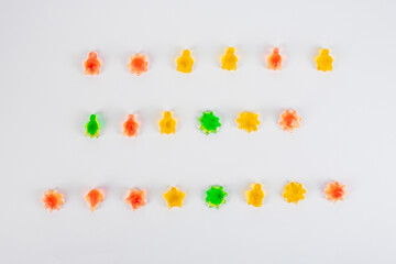 Assorted gummy candies, Juicy colorful jelly sweets. Gummy candies on white background