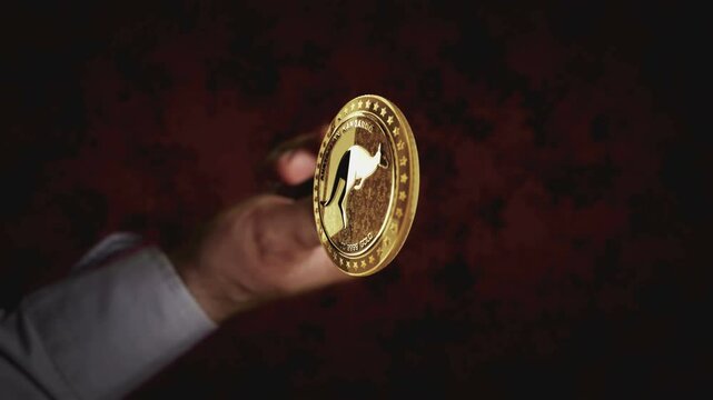 Kangaroo Australia bullion rotating hand coin toss. Transaction and blockchain technology symbol throws to flip on heads or tails slowmotion 3d abstract concept.