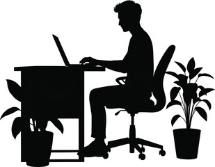 Silhouette of a Person Working at a Desk