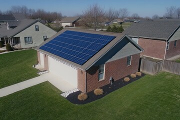 Checking Solar Panel Alignment for Maximum Efficiency on a Sunny Day at a Residential Property With a Pool