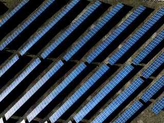 Abstract top down photo of solar panel farm. Aerial photography. Earth Day concept.