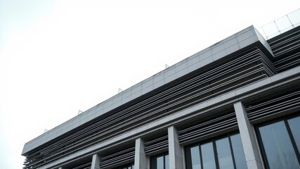Fototapeta premium Soviet modernism architecture style building in Dombay, featuring geometric shapes, concrete facade, and stark lines, lines, building