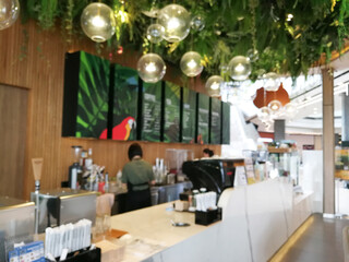 Blurry counter cashier at coffee shop.