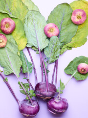 Turnip cabbage and radish over violet background