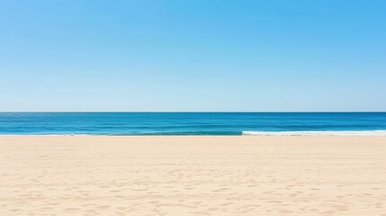 Fototapeta premium Tranquil beach with clear blue sky and ocean