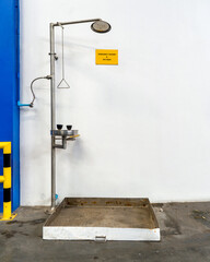 Emergency shower and eye wash station for chemical accident in storage warehouse