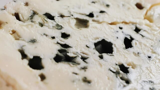 Healthy blue cheese Roquefort or Gorgonzola close-up cheese texture. High quality 4k footage