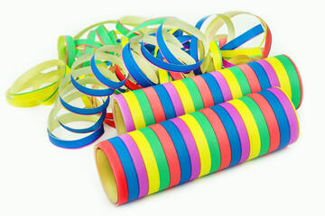 Colorful paper streamers on white background