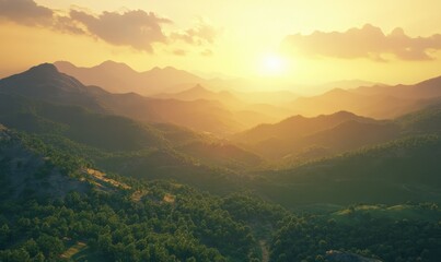Obraz premium Scenic mountain view glowing under the warm golden light of sunrise, with rolling green hills creating a peaceful natural scene