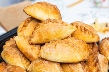 Kibinai, traditional Lithuanian food, pastries filled with various meat, onion and pepper, popular with Karaite ethnic minority in Vilnius, Lithuania, street food market