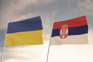 Flags of Ukraine and SERBIA waving with cloudy blue sky background, relations between countries.3D rendering.