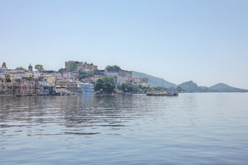The City Palace by lake Pichola in Udaipur, the city of lakes in the Province of Rajasthan, India.