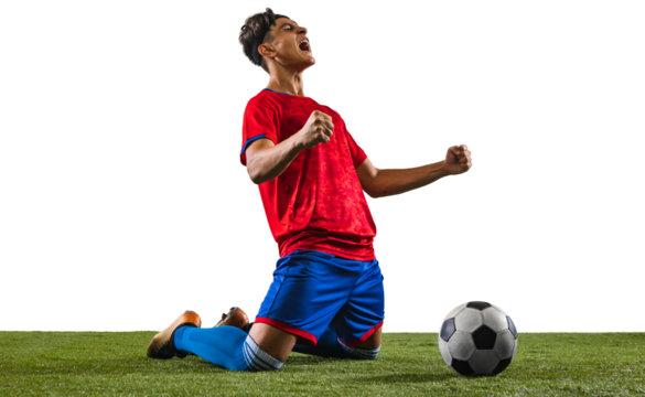 One young soccer football player fell on his knee in winning pose after successful match on grassland against transparent background. Concept of tournament, match, action, team sport game, energy.